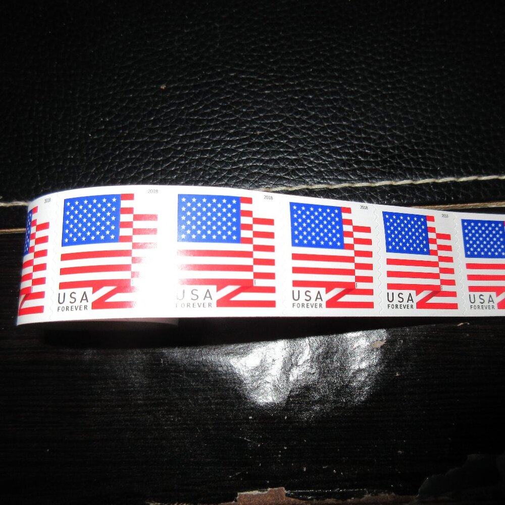 Roll of 100 forever stamps.